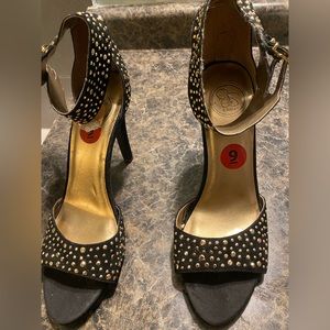 Black and gold Jessica Simpson high heeled shoes